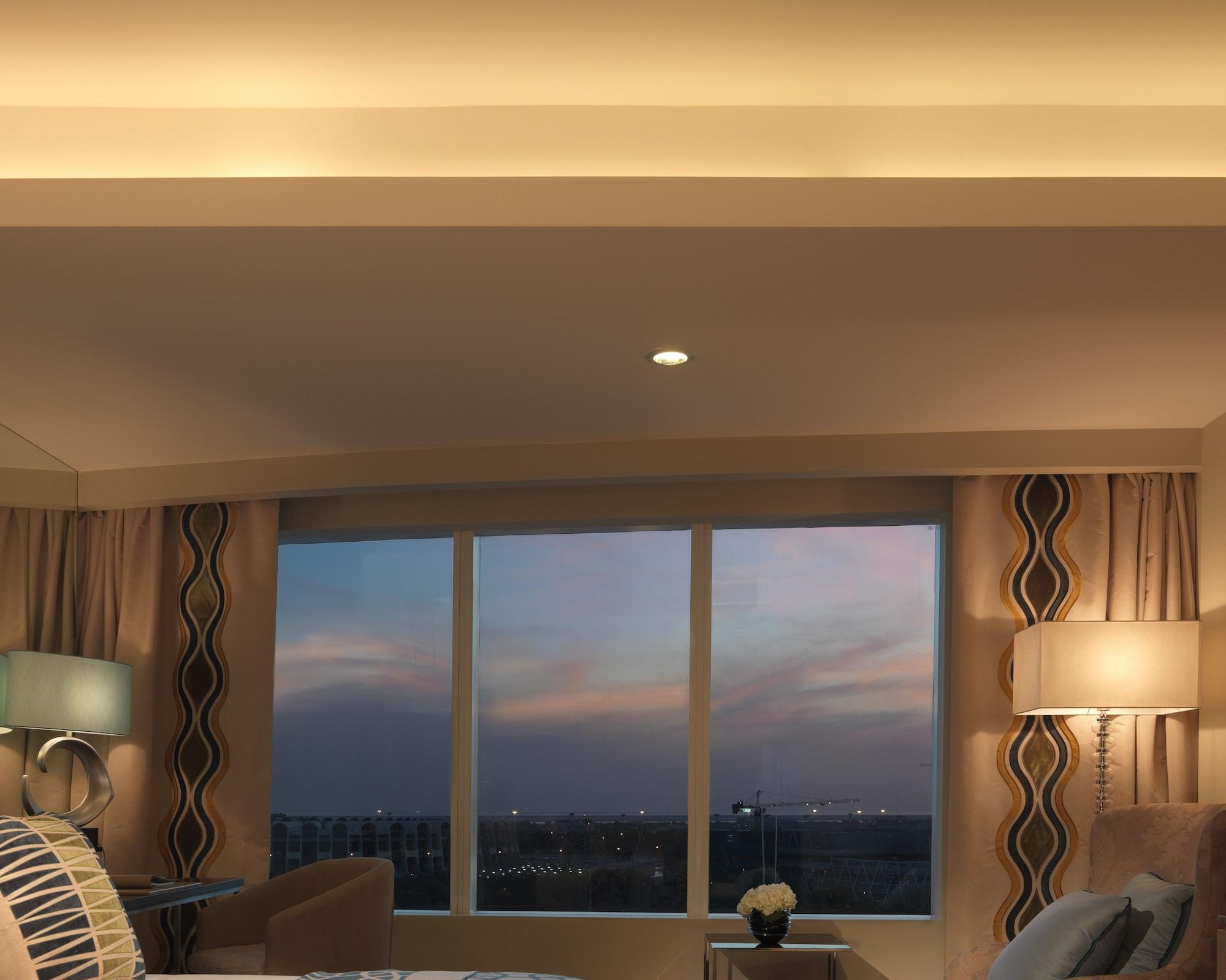فندق ميلينيوم الروضة أبو ظبي المظهر الخارجي الصورة A view of the skyline from a room at the Four Seasons Hotel in Seoul, South Korea.